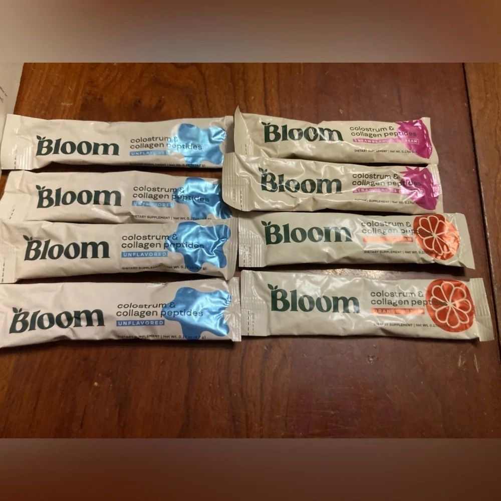 Bloom Colostrum Starter Kit with Green Mixer. New in box. Comes with 8 packets